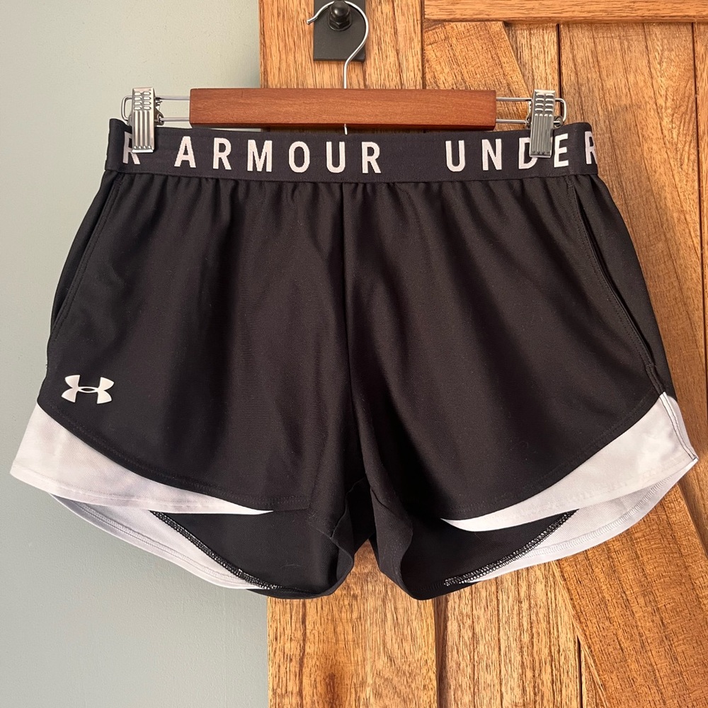 Under Armour Black and White Athletic Shorts with loose fit.